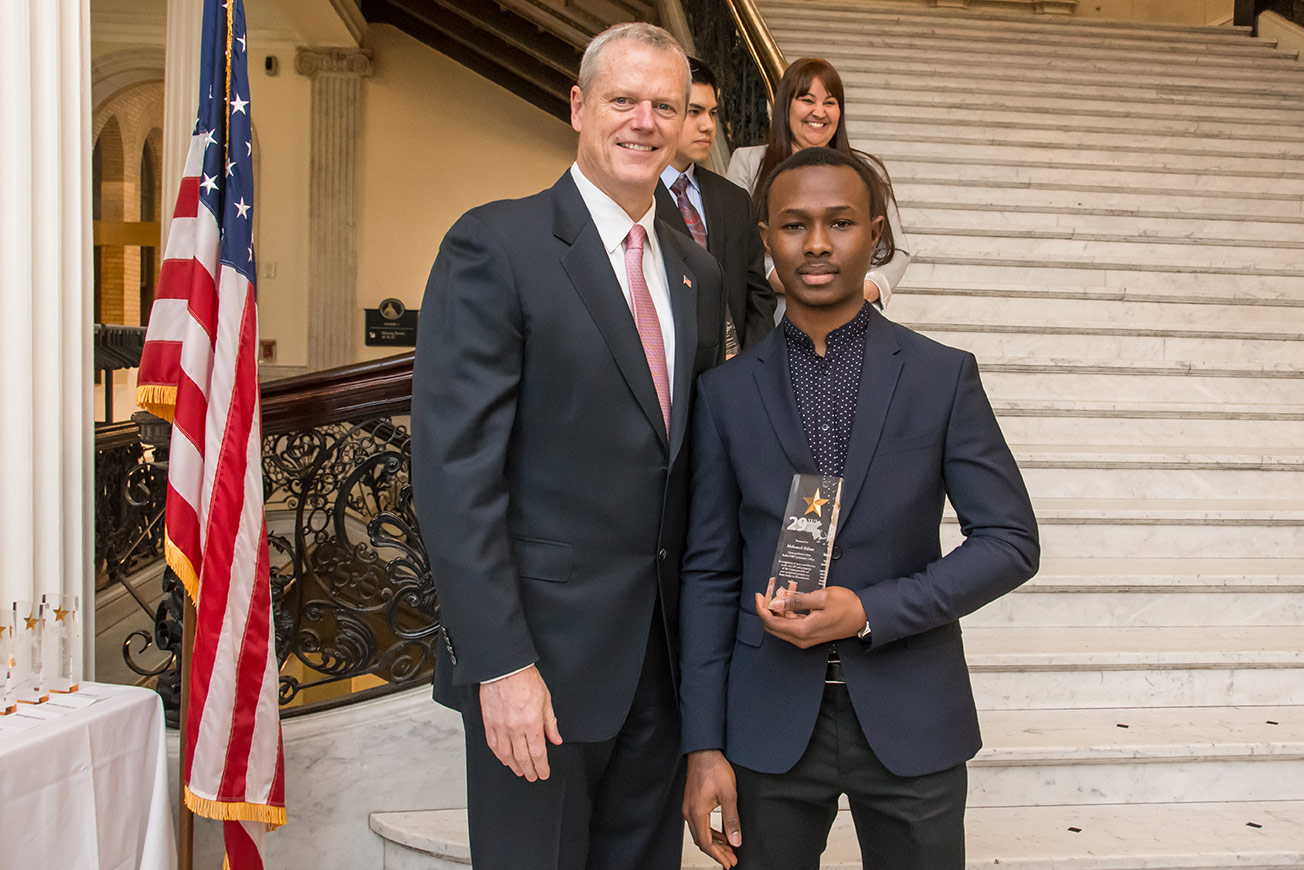 Bunker Hill Community College student Mohamed Sidime with Gov. Charlie Baker