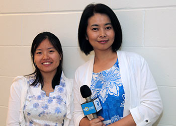 Zhuo Jun Wang with Tong Jiao, Zhuhai television anchor