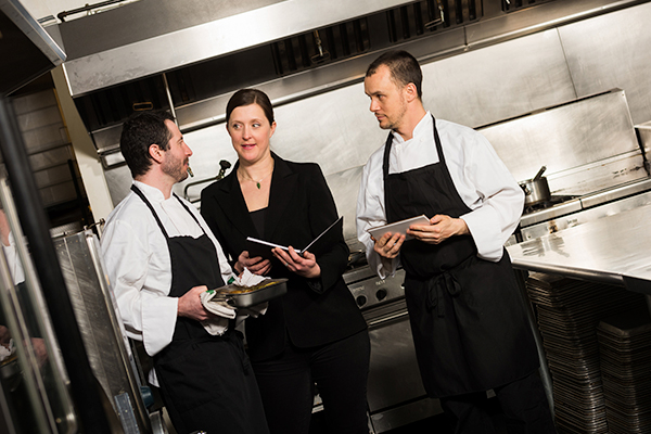 restaurant manager in a kitchen
