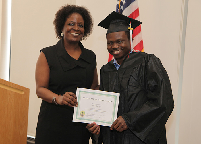 student receiving his award