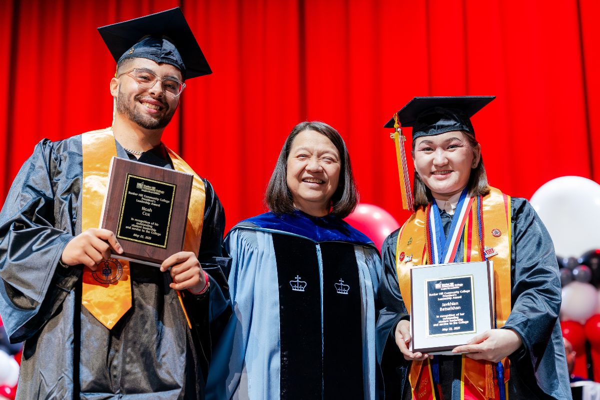 Pam Jay and Noah with award