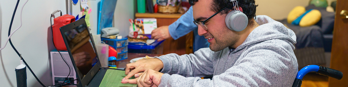 a person using assistive technology on a computer a person using assistive technology on a computer