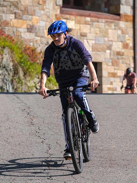 Brian Ramos on a bicycle