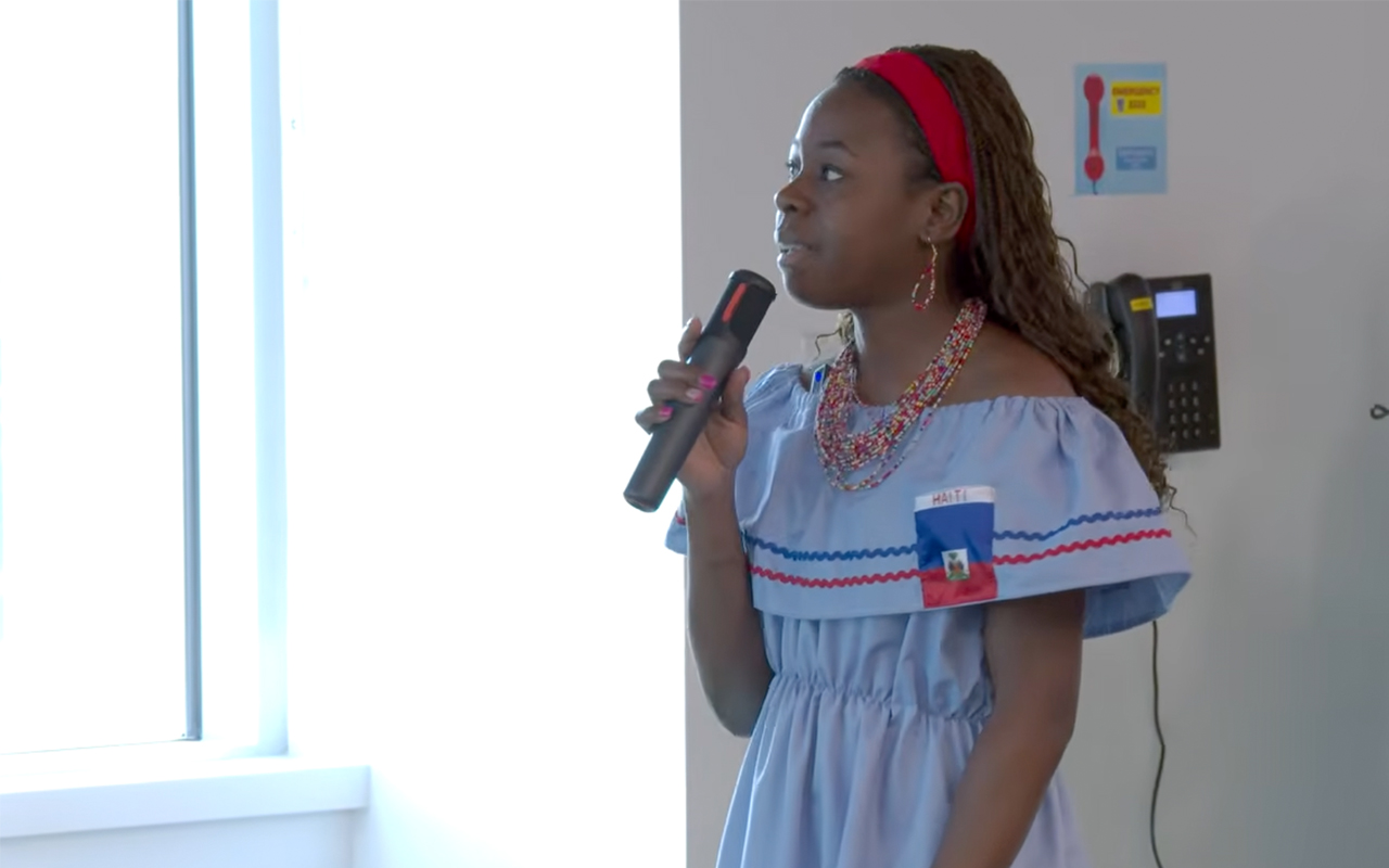 student performing at Voice on the Wall