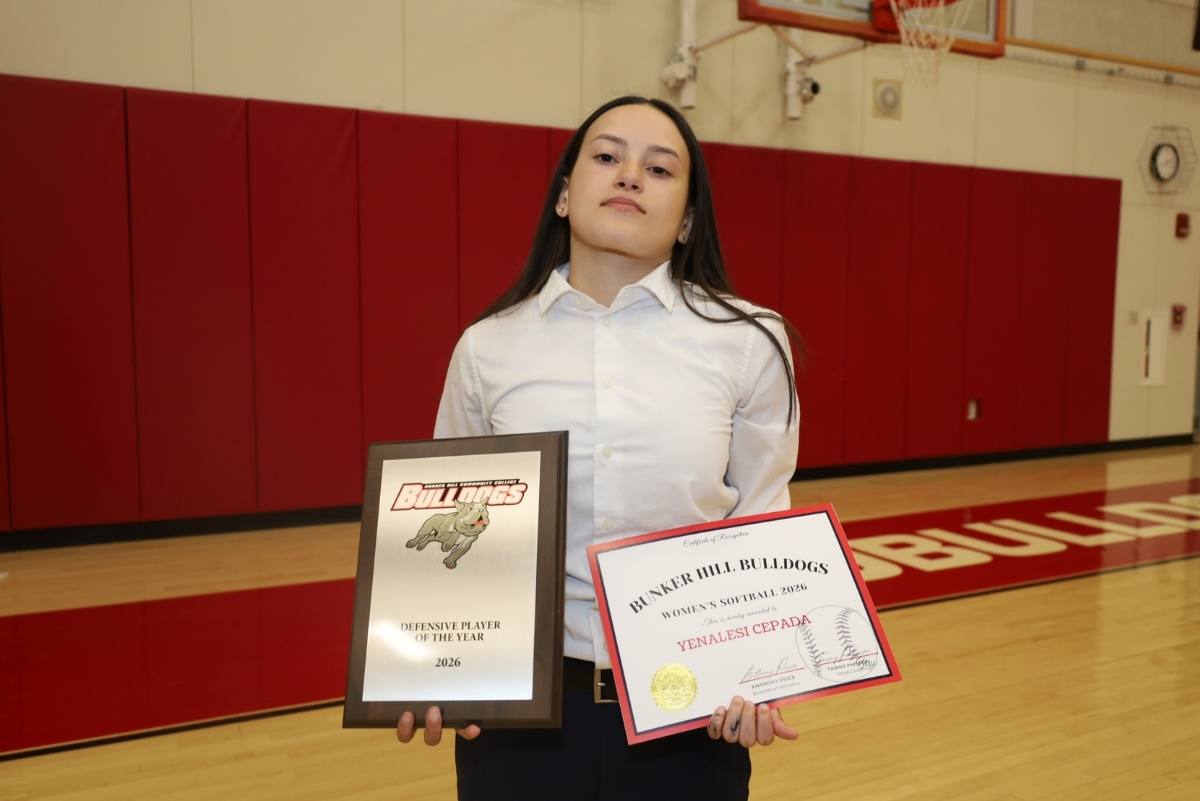 a student with her awards