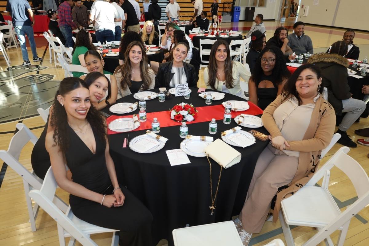 students at a table at the awards dinner