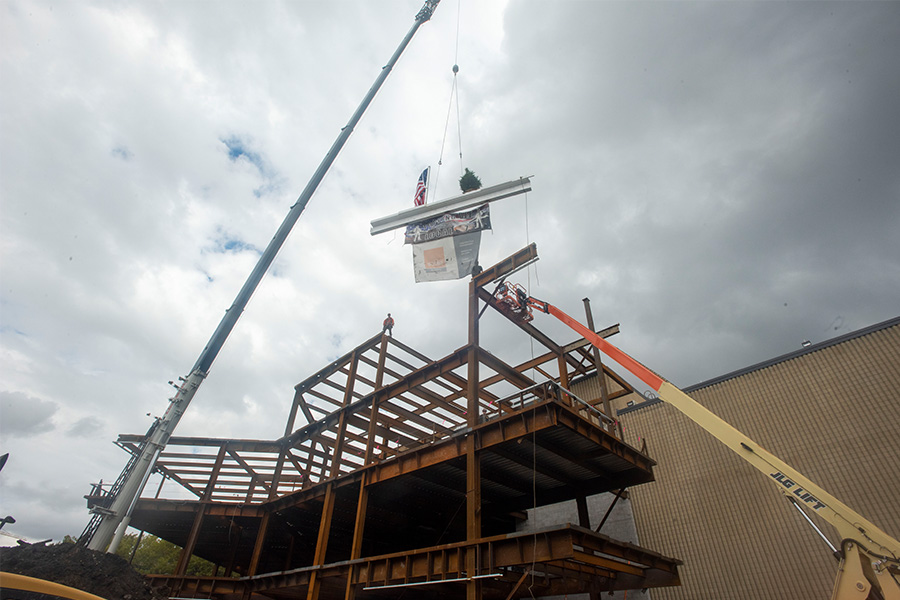 Lowering beam into a structure