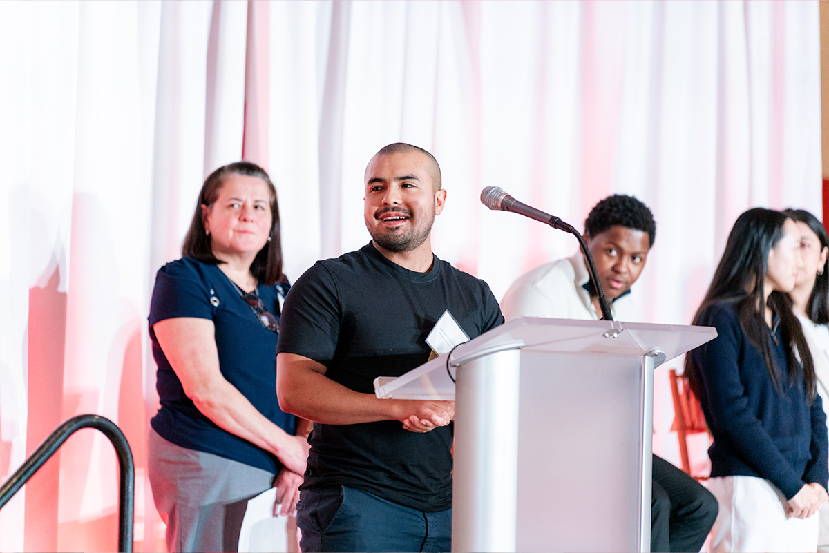 student speaking on stage