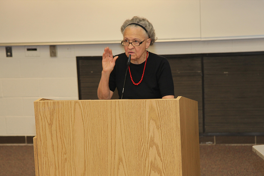 woman speaking at a podium