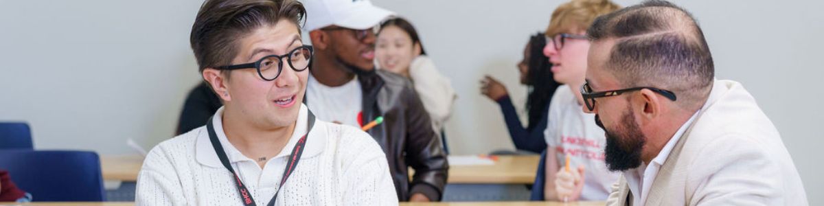 Student and teacher in a classroom 
