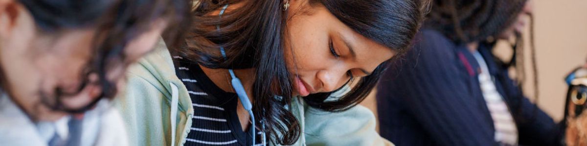 student doing classwork in the classroom 