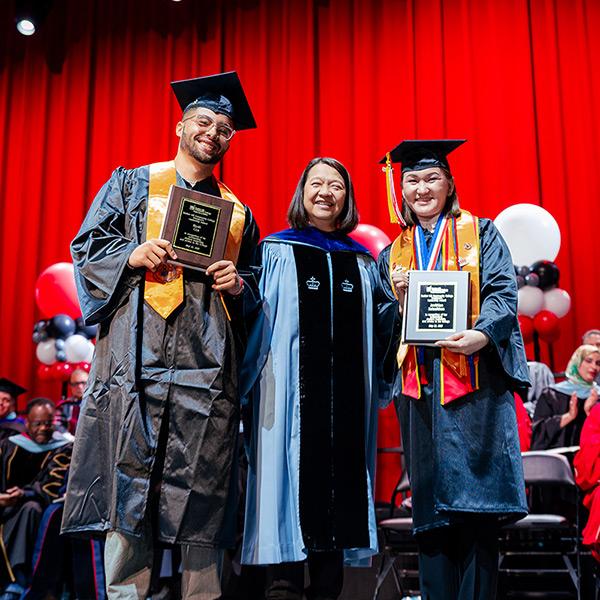 President Eddinger with Noah Cox and Javkhlan Batsaikhan.