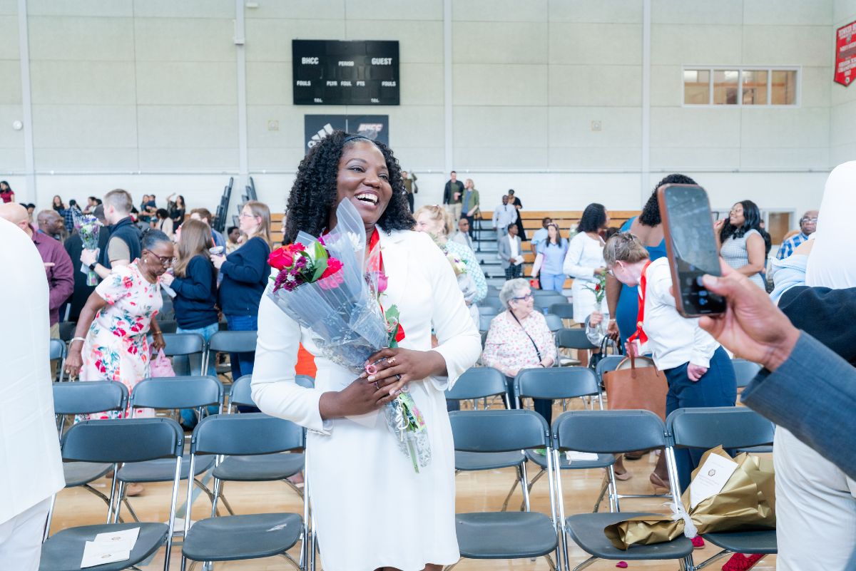 Nursing student with flowers