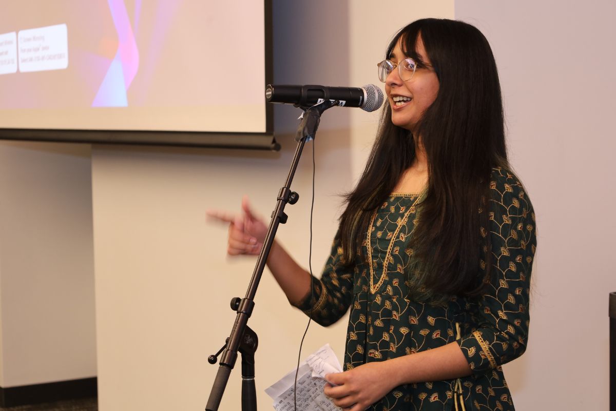 Student speaking at event