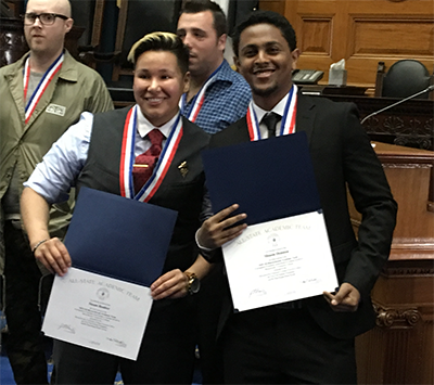 Susan Benitez and Mussie Demisse recieving their Phi Theta Kappa’s (PTK) All-Massachusetts Academic Team awards