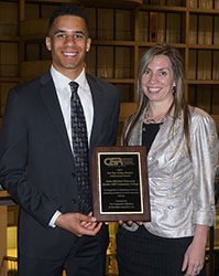 Learn and Earn 2016 Photo of John Michael Kawooya, a BHCC student working as an intern at Raytheon in Waltham, and Sharon Schaff, BHCC Director of Career Advancement and Internships. 