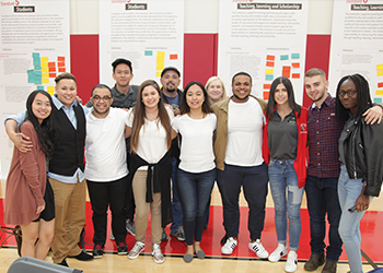 students and staff pose for a photo at the retreat