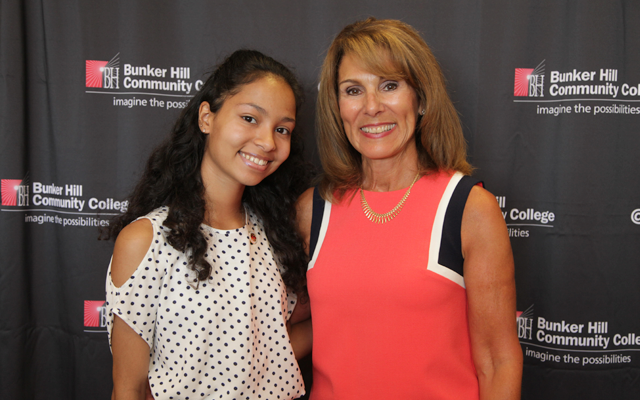 student and faculy member at the summer health science pinning