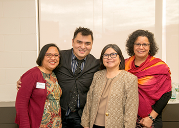 Jose Vargas posing with 3 members of the BHCC staff