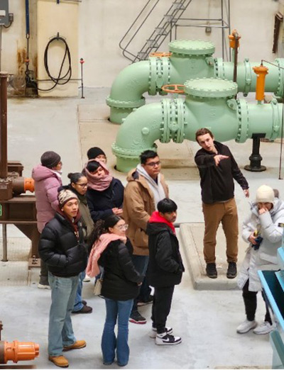 A group of students at a public water plant